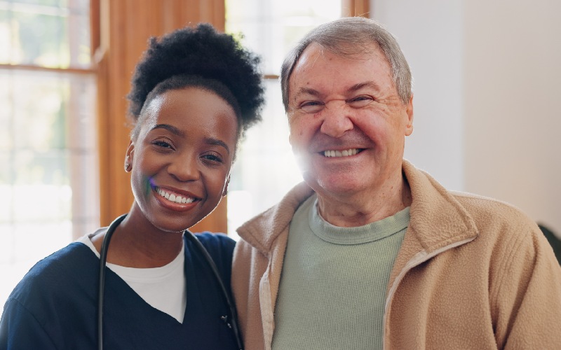face hug senior man nurse home healthcare happiness support medicare