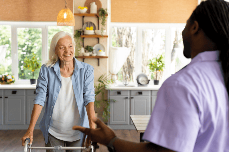 senior patient talking with caretaker